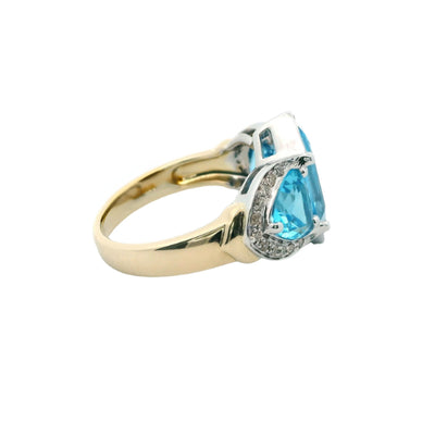 Blue topaz and diamond dress ring in 9ct white gold