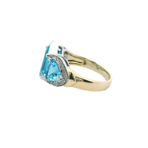 Blue topaz and diamond dress ring in 9ct white gold