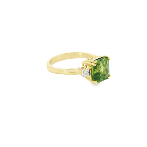 Phoenix - cushion cut peridot and diamond ring in 9ct yellow gold