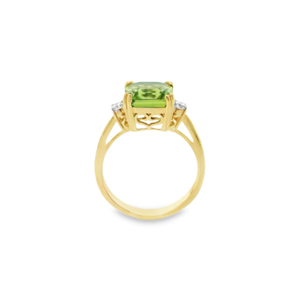 Phoenix - cushion cut peridot and diamond ring in 9ct yellow gold