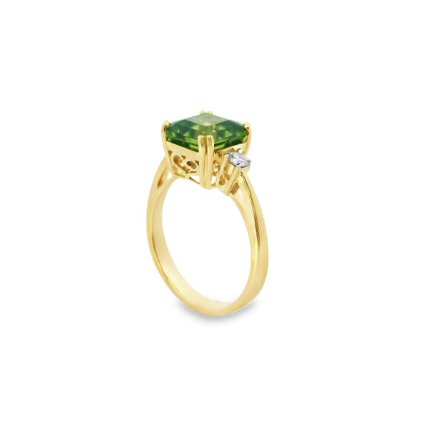 Phoenix - cushion cut peridot and diamond ring in 9ct yellow gold