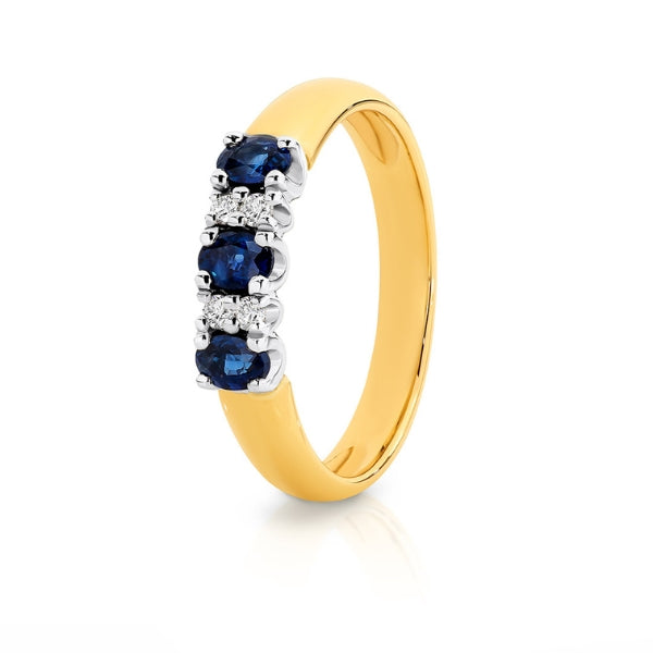 Sapphire & diamond anniversary ring in two tone gold