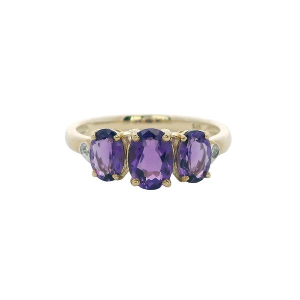 Three stone amethyst dress ring 9ct yellow gold