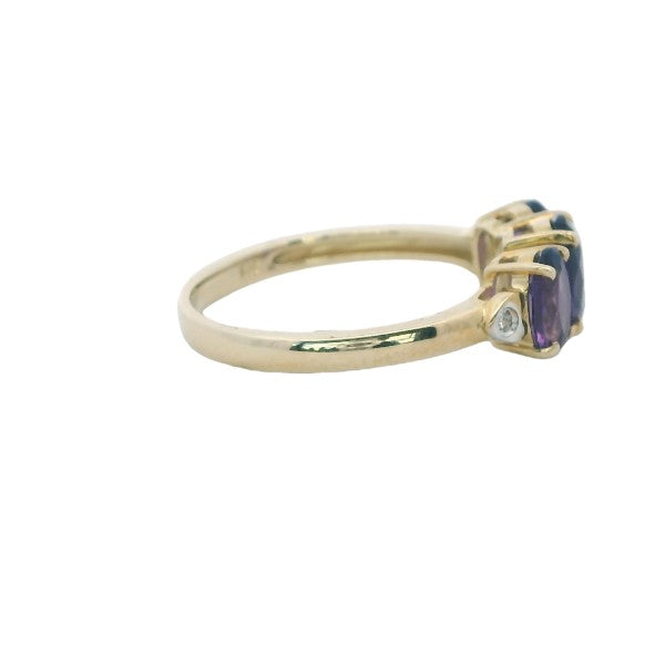 Three stone amethyst dress ring 9ct yellow gold