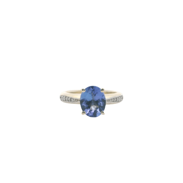 Tanzanite and diamond ring in 9ct yellow gold