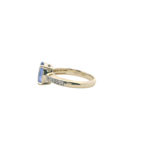 Tanzanite and diamond ring in 9ct yellow gold