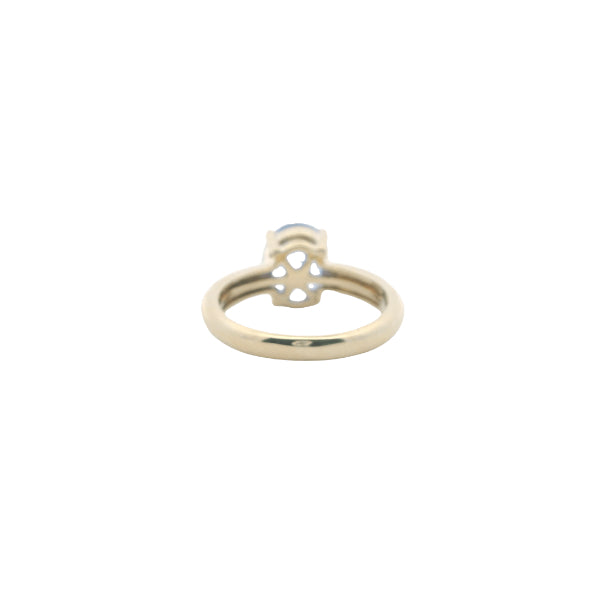 Tanzanite and diamond ring in 9ct yellow gold
