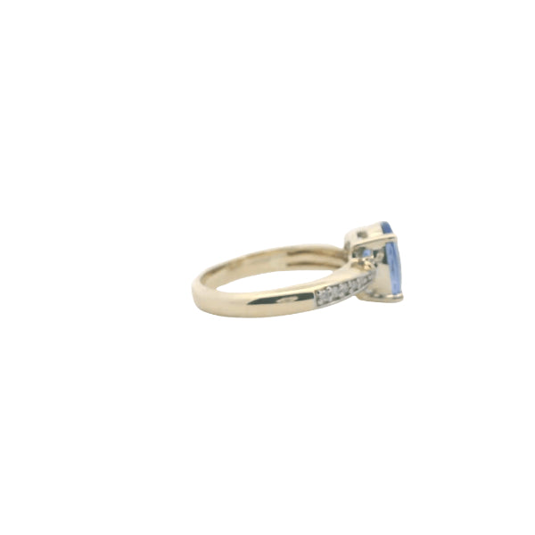 Tanzanite and diamond ring in 9ct yellow gold