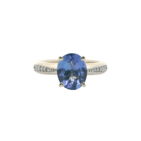 Tanzanite and diamond ring in 9ct yellow gold