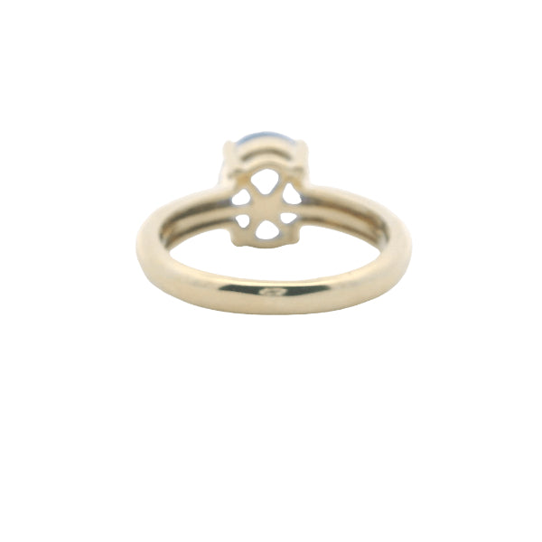 Tanzanite and diamond ring in 9ct yellow gold