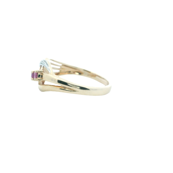 Ruby and diamond dress ring in 9ct yellow gold