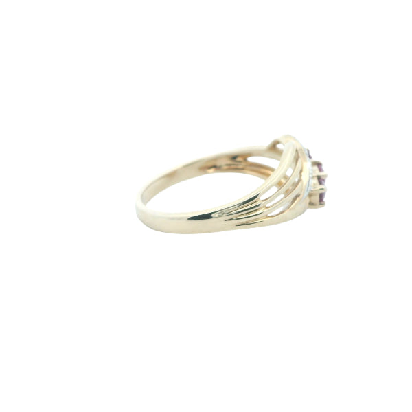 Ruby and diamond dress ring in 9ct yellow gold