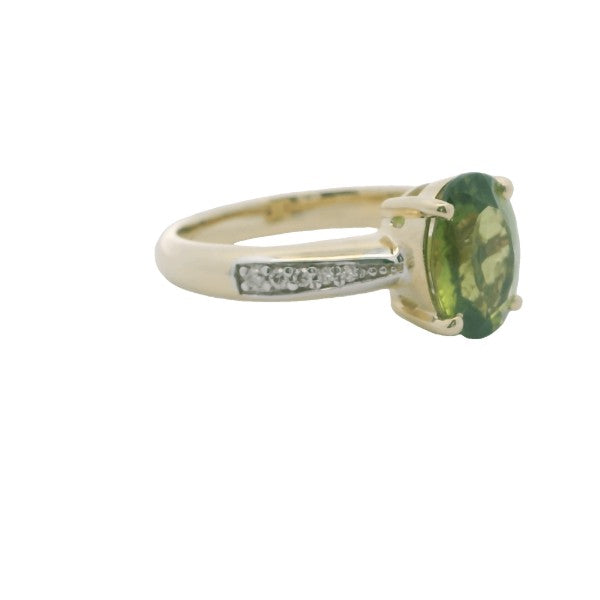 Peridot and diamond dress ring in 9ct yellow gold