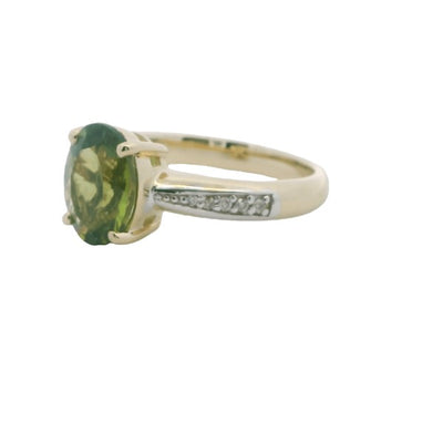 Peridot and diamond dress ring in 9ct yellow gold