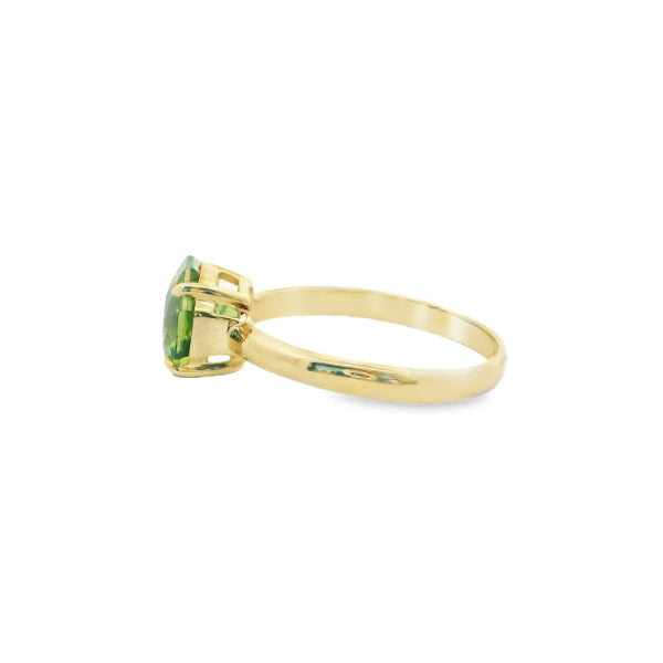 Octagonal peridot ring in 9ct yellow gold