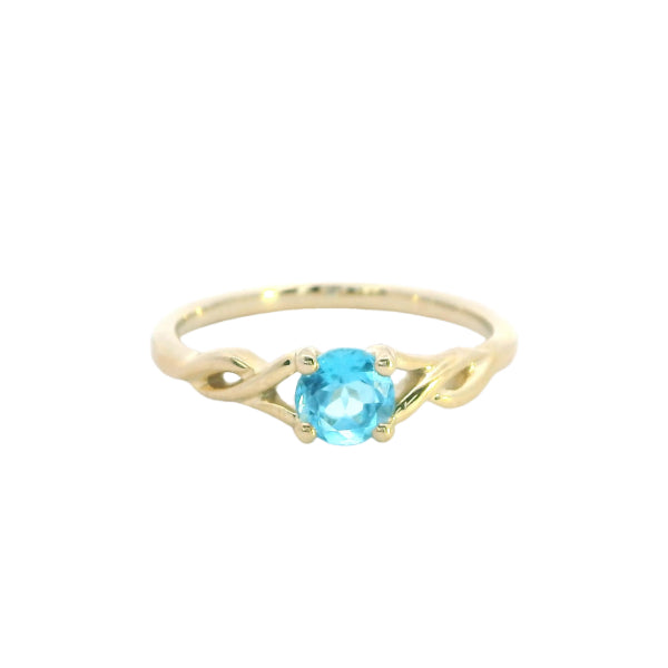 Blue topaz dress ring with twisted shoulders in 9ct yellow gold