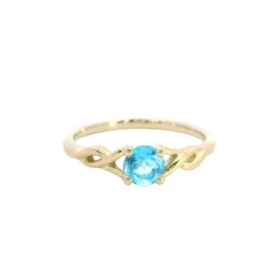 Blue topaz dress ring with twisted shoulders in 9ct yellow gold