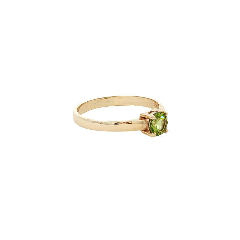 Round peridot dress ring in 9ct yellow gold