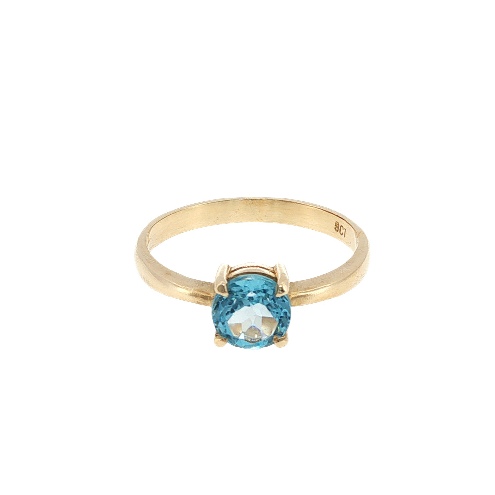 Round blue topaz solitaire dress ring in 9ct yellow gold