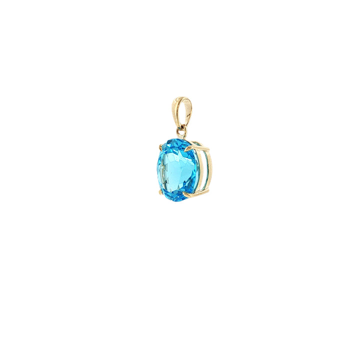 Oval blue topaz pendant in 9ct yellow gold