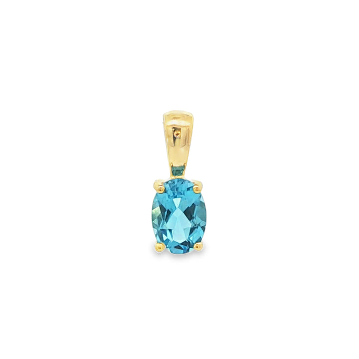 Oval blue topaz pendant in 9ct yellow gold