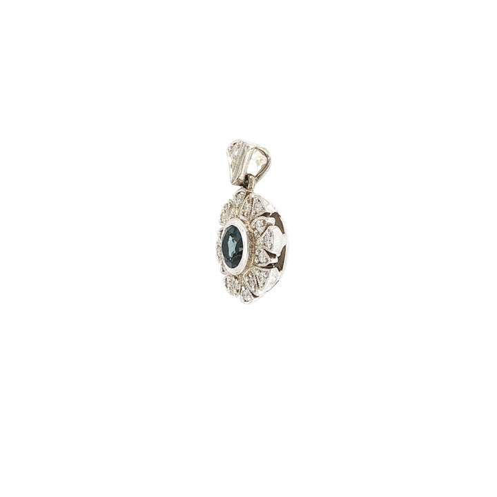London blue topaz and diamond pendant in 9ct white gold