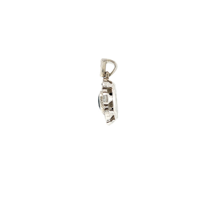 London blue topaz and diamond pendant in 9ct white gold