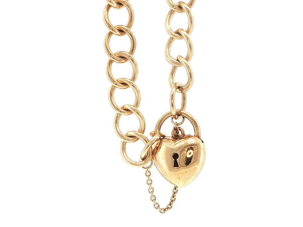 Open curb bracelet with puff heart clasp in 9ct yellow gold - 18cm