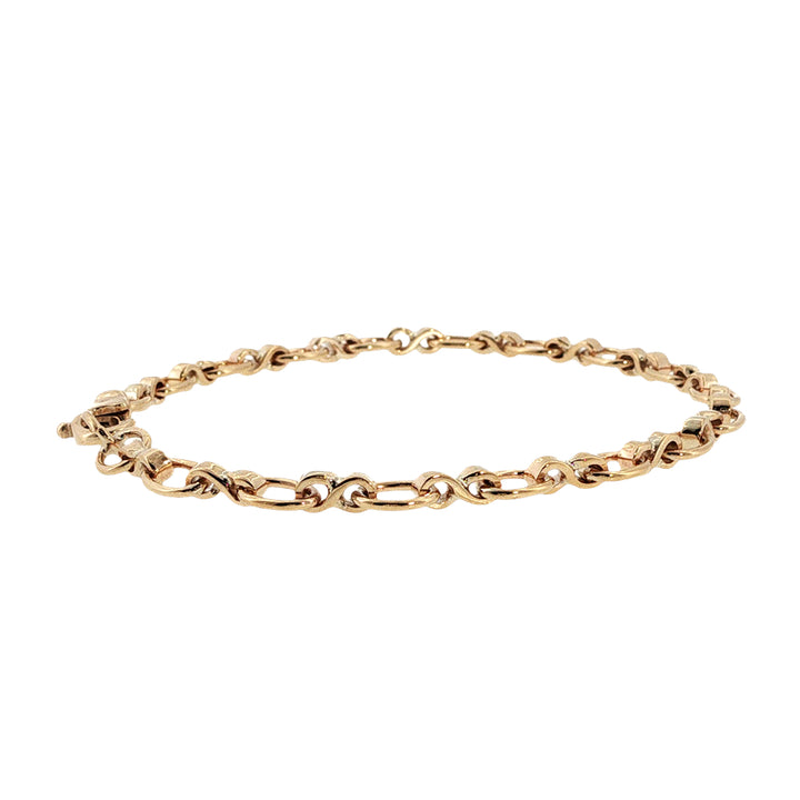 Oval cable infinity bracelet in 9ct yellow gold