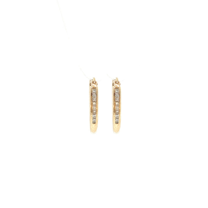 Oval hoop earrings with princess cut diamonds in 9ct yellow gold