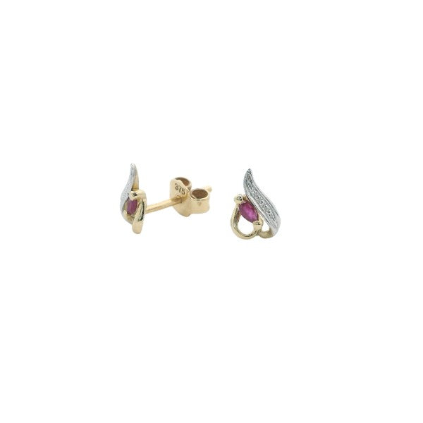 Marquise ruby studs in 9ct yellow gold.