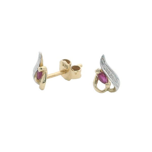 Marquise ruby studs in 9ct yellow gold.