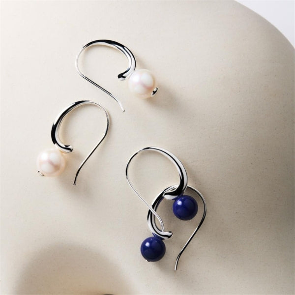 Najo - fern fresh water pearl hook earrings in sterling silver