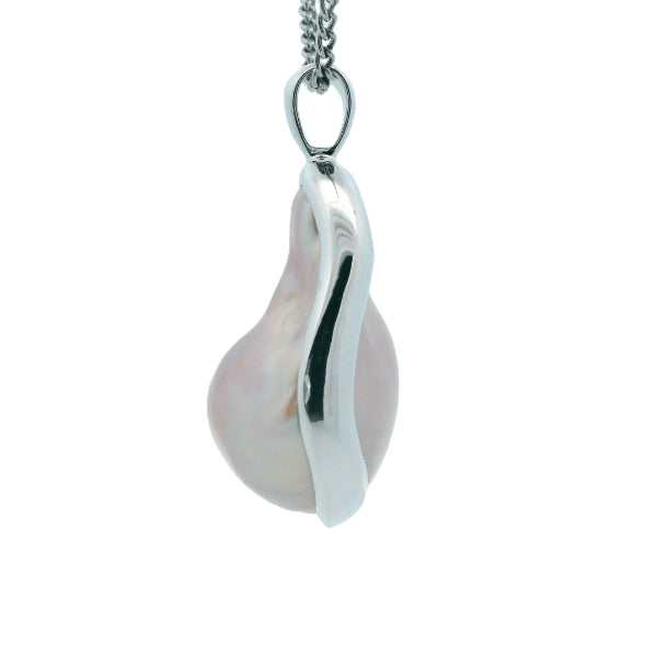 Natural pink baroque freshwater pearl pendant in sterling silver frame
