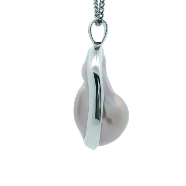 Natural pink baroque freshwater pearl pendant in sterling silver frame