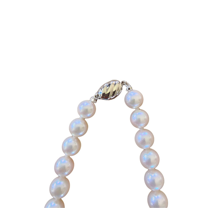 Akoya Pearls on silver wire with push button clasp