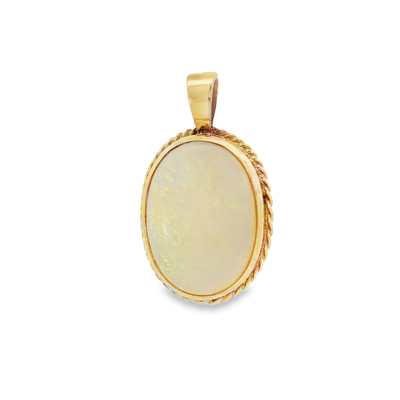 Rope edged oval australian opal pendant in 9ct yellow gold