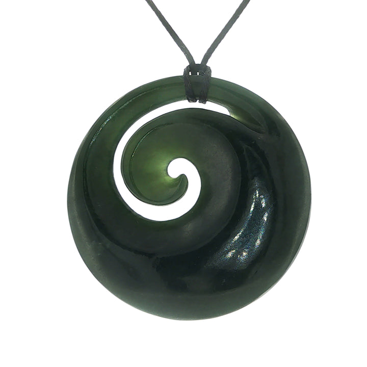 NZ pounamu greenstone circle porowhita with koru necklace on slider cord