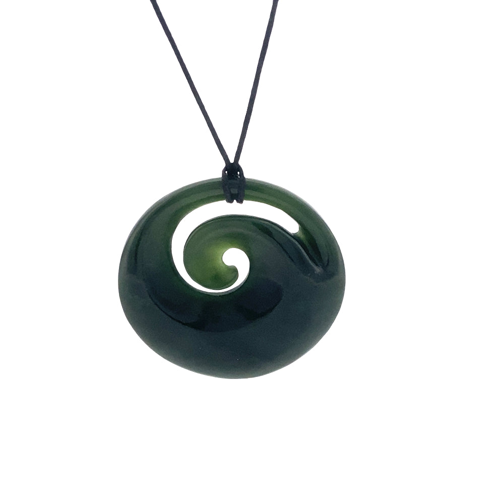 NZ pounamu greenstone circle porowhita with koru necklace on slider cord