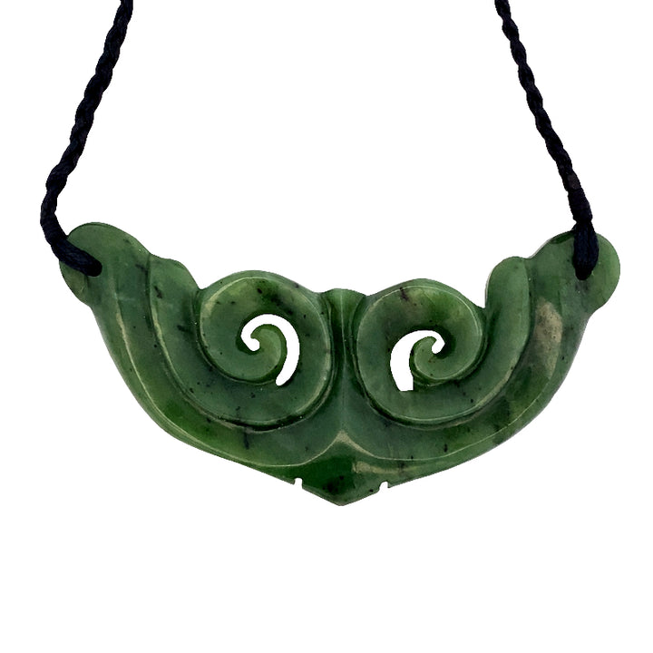 NZ pounamu greenstone breastplate with koru