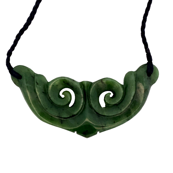 NZ pounamu greenstone breastplate with koru
