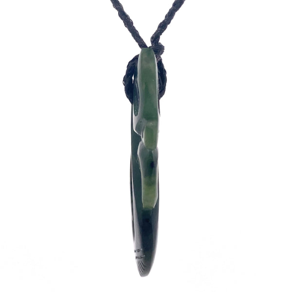 NZ pounamu greenstone carved manaia with paua eye on plaited slider