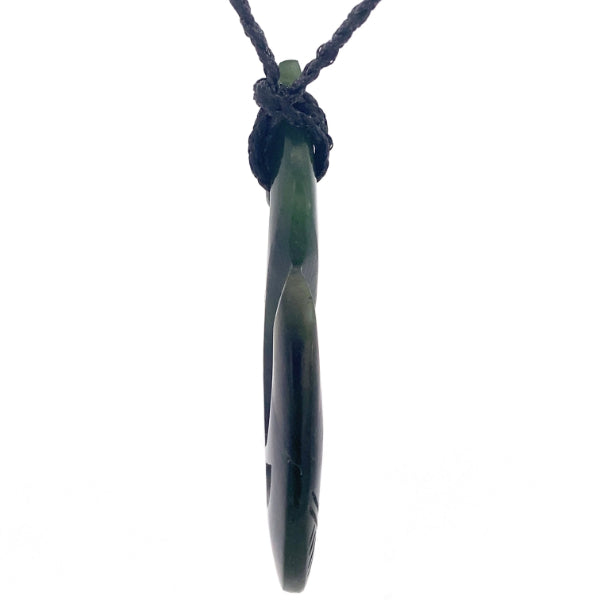 NZ pounamu greenstone carved manaia with paua eye on plaited slider