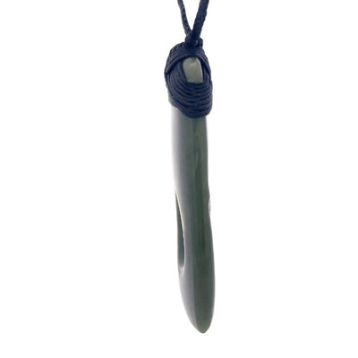 NZ pounamu bound toki with two koru on slider cord