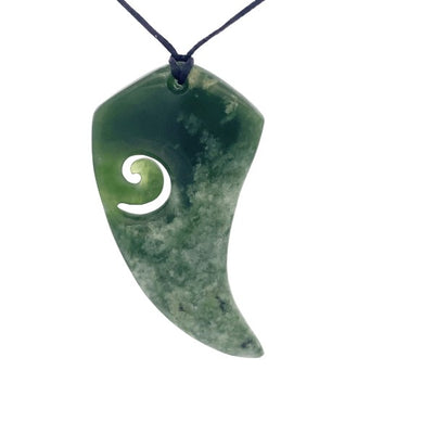 NZ pounamu greenstone fern shaped with koru