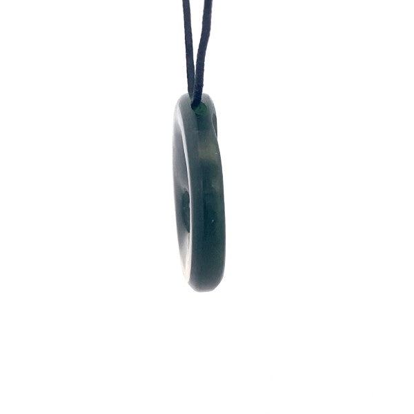 NZ pounamu greenstone circle with triple koru on slider cord