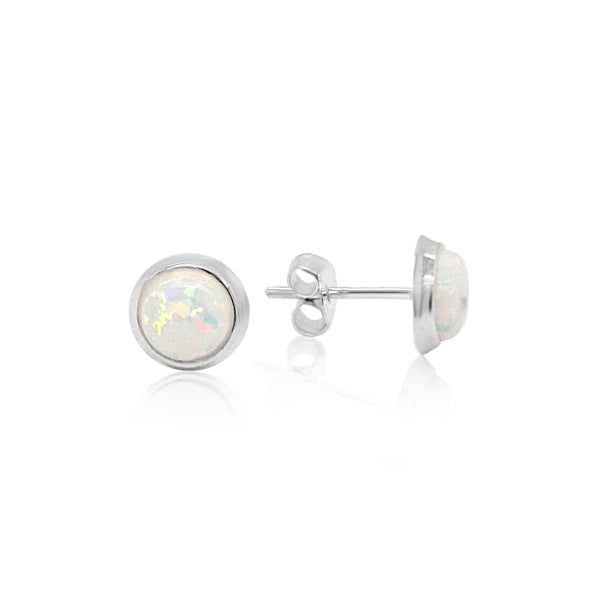 Round white synthetic opal earrings in sterling silver