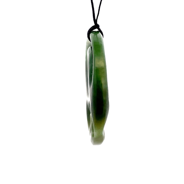 NZ pounamu greenstone medium round with koru pendant on slider cord by Aden Hoglund