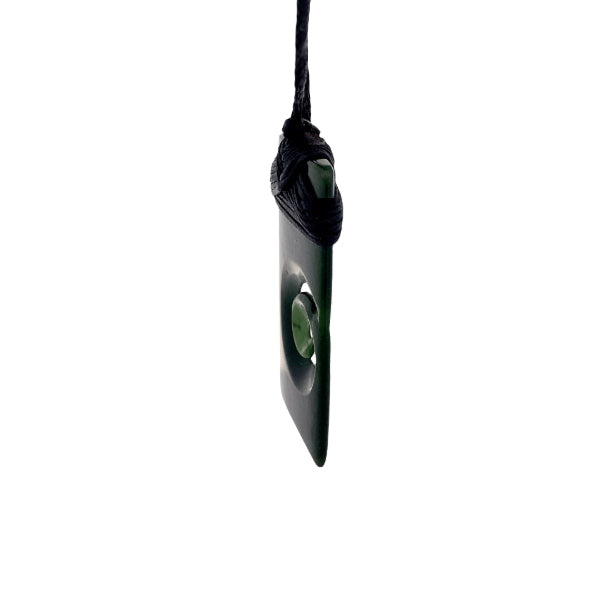 NZ pounamu greenstone bound toki with koru necklace on slider cord by Aden Hoglund