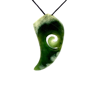 NZ pounamu greenstone fern shaped with koru